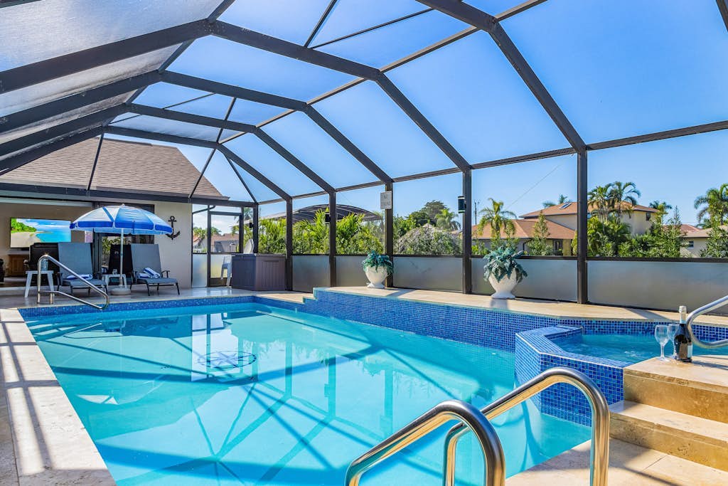 Canal front home with private pool, direct gulf access, and internet