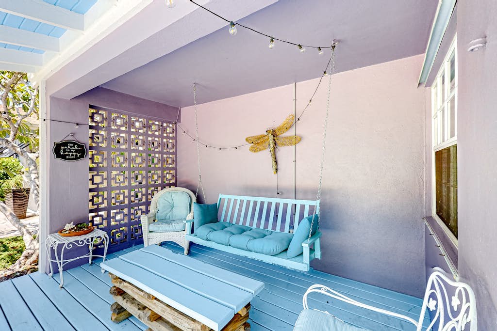 Enchanting dog-friendly beach bungalow with patio, fireplace, deck, AC, & W/D