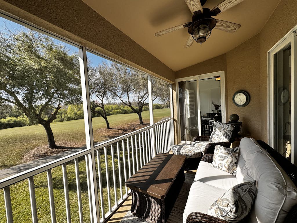 Resort community home with bikes, screened porch, on-site golf, & AC
