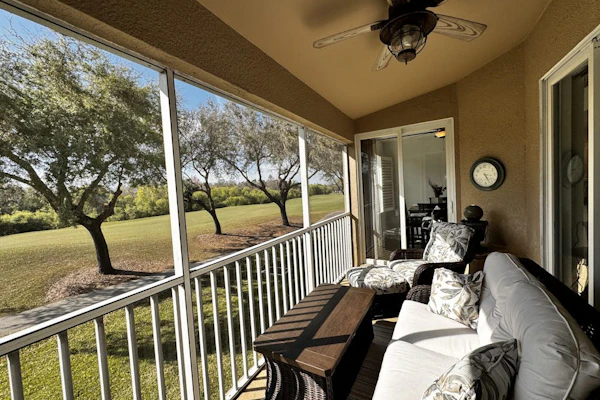 Resort community home with bikes, screened porch, on-site golf, & AC