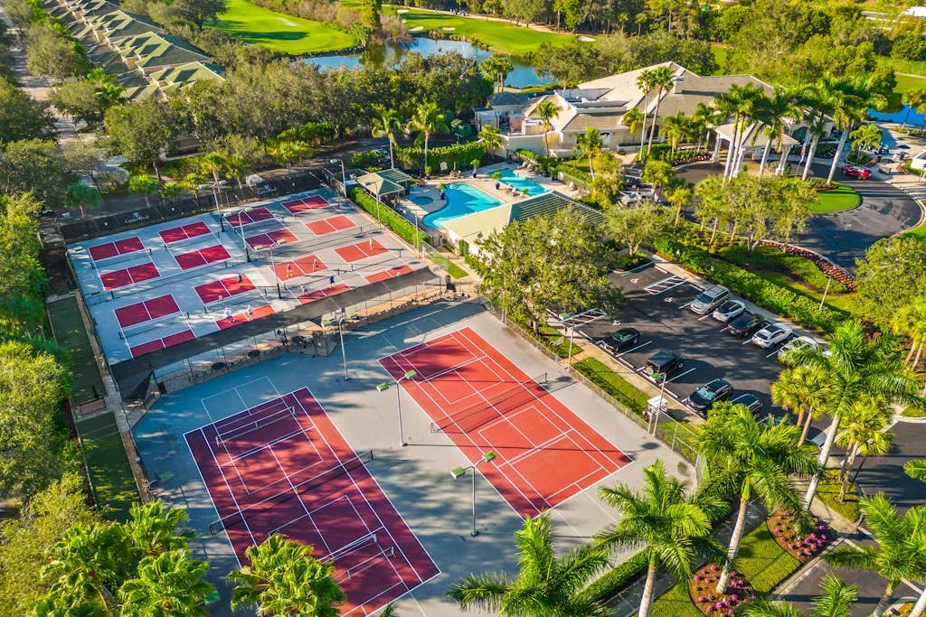 Resort community home with bikes, screened porch, on-site golf, & AC