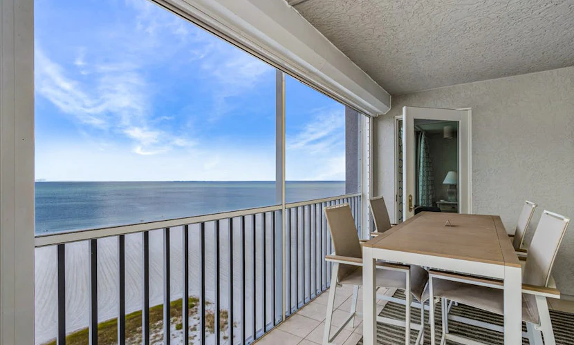 Waterfront penthouse with beach views, pool, hot tub, & tennis court