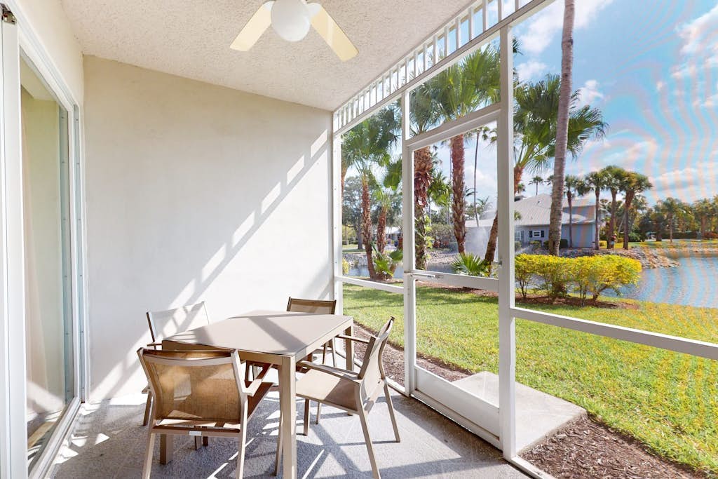 Lakefront condo with pool, tennis, lake views, grill, patio, W/D, fast WiFi & AC