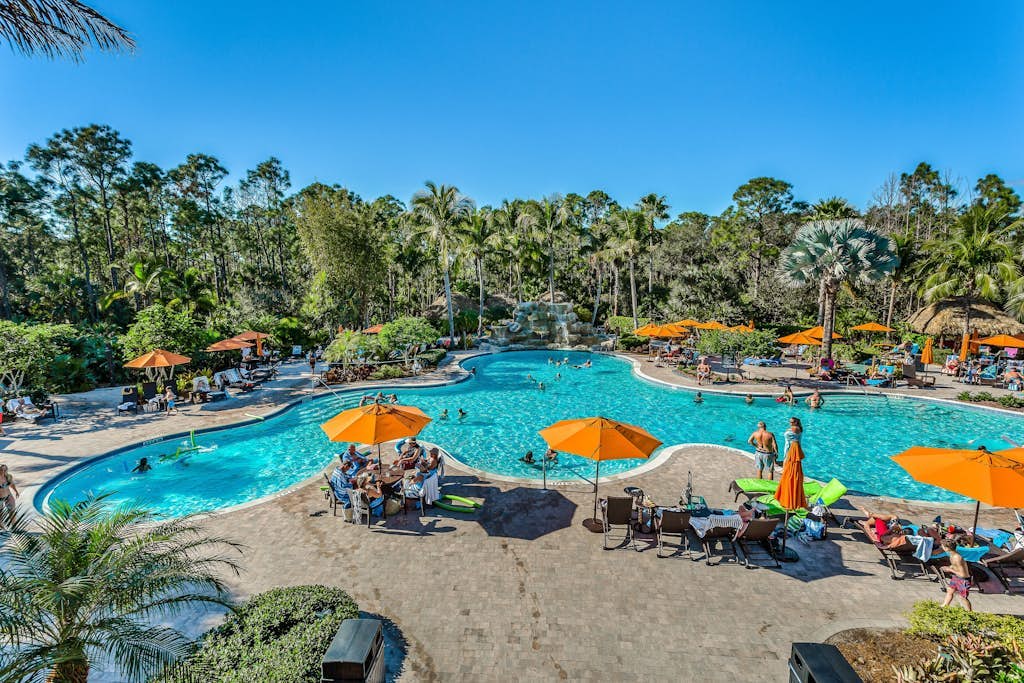 Resort condo with private W/D, shared pool, and central AC