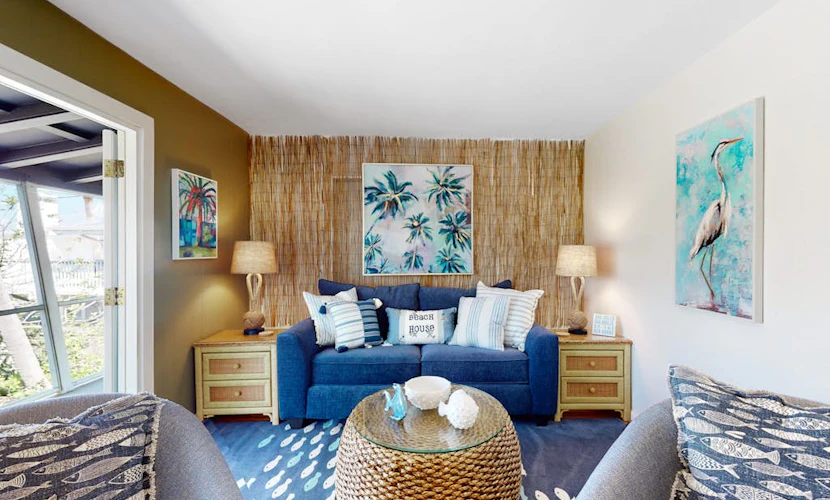 Tropical Palm Island home steps from the beach with grill, outdoor shower, dock