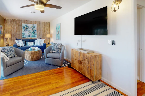 Tropical Palm Island home steps from the beach with grill, outdoor shower, dock