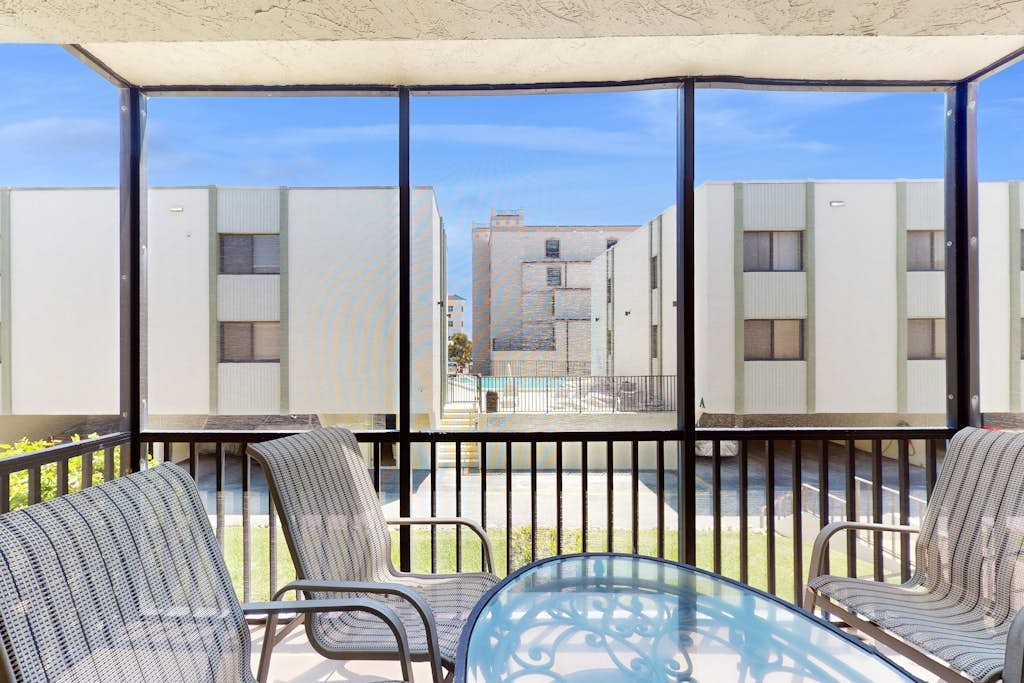 Beachfront condo with pool, private balcony, and washer and dryer