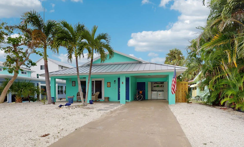 Single-story home with private yard, AC, & W/D - walk to beach, & dog-friendly