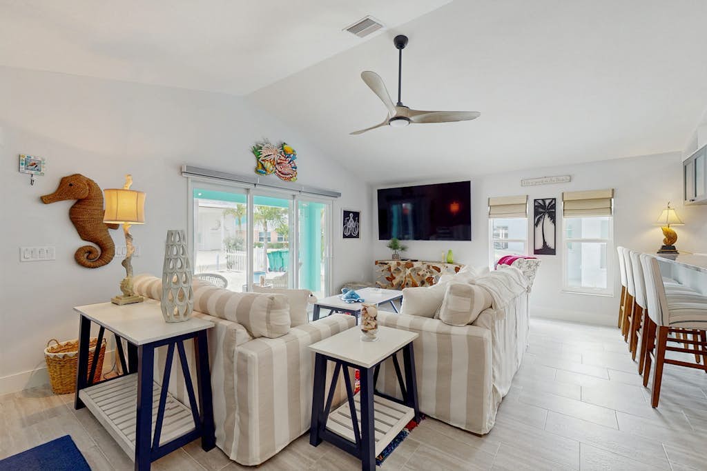 Single-story home with private yard, AC, & W/D - walk to beach, & dog-friendly