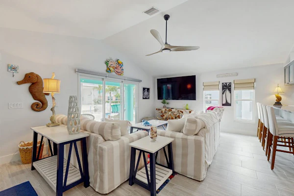 Single-story home with private yard, AC, & W/D - walk to beach, & dog-friendly