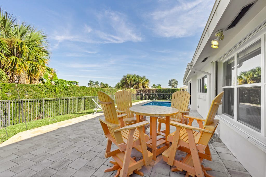 Snowbird-friendly home near water with private heated pool, grill, patio, & W/D