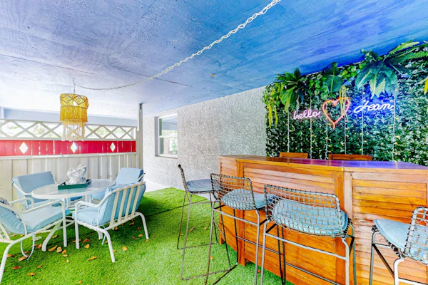 Updated home near beach/golf with private yard, firepit, & home office