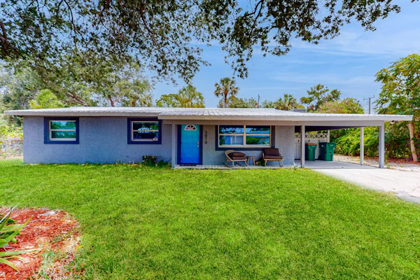 Updated home near beach/golf with private yard, firepit, & home office