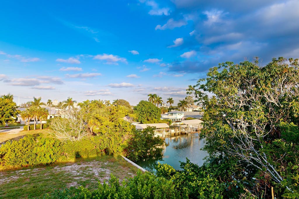 Dog-friendly single-level condo with furnished patio, rooftop, & washer/dryer