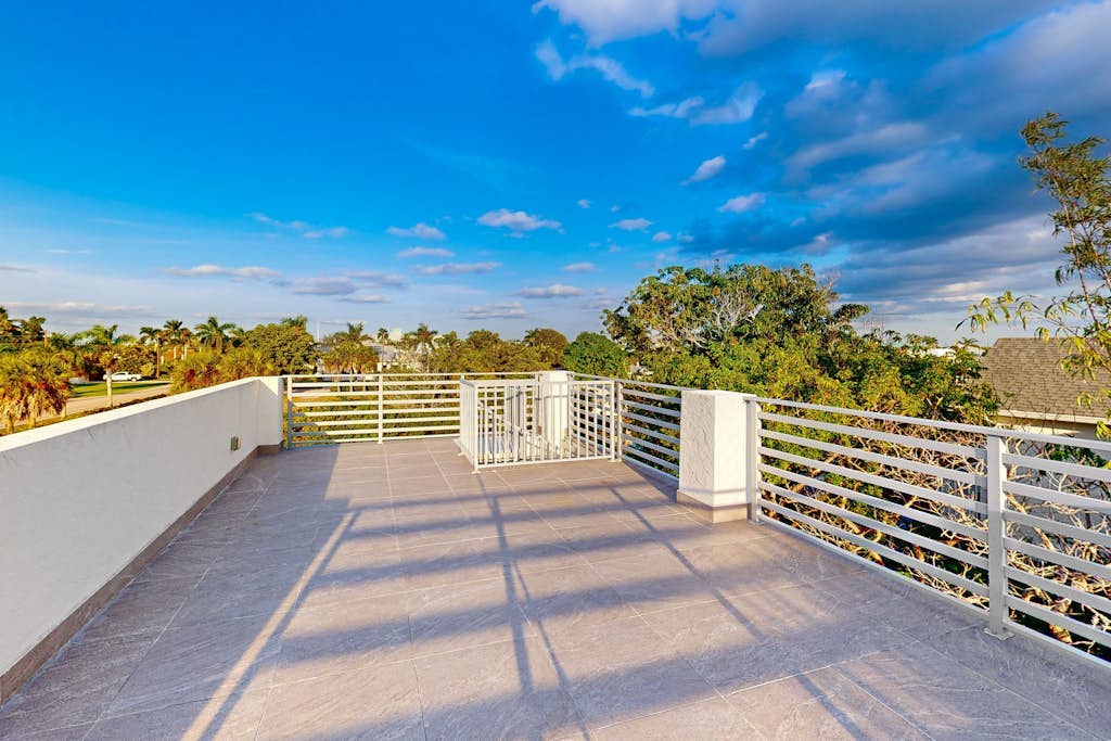 Dog-friendly single-level condo with furnished patio, rooftop, & washer/dryer