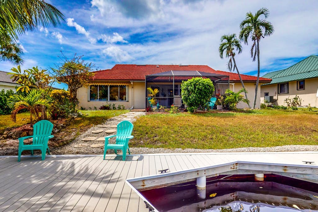 Waterfront Home with Private Dock & Enclosed Lanai - Near Residence Beach