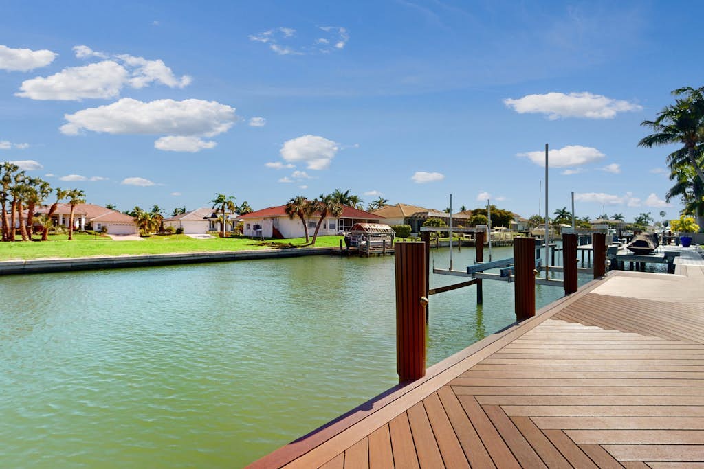 Snowbird-friendly home with private pool, enclosed lanai, & putting green