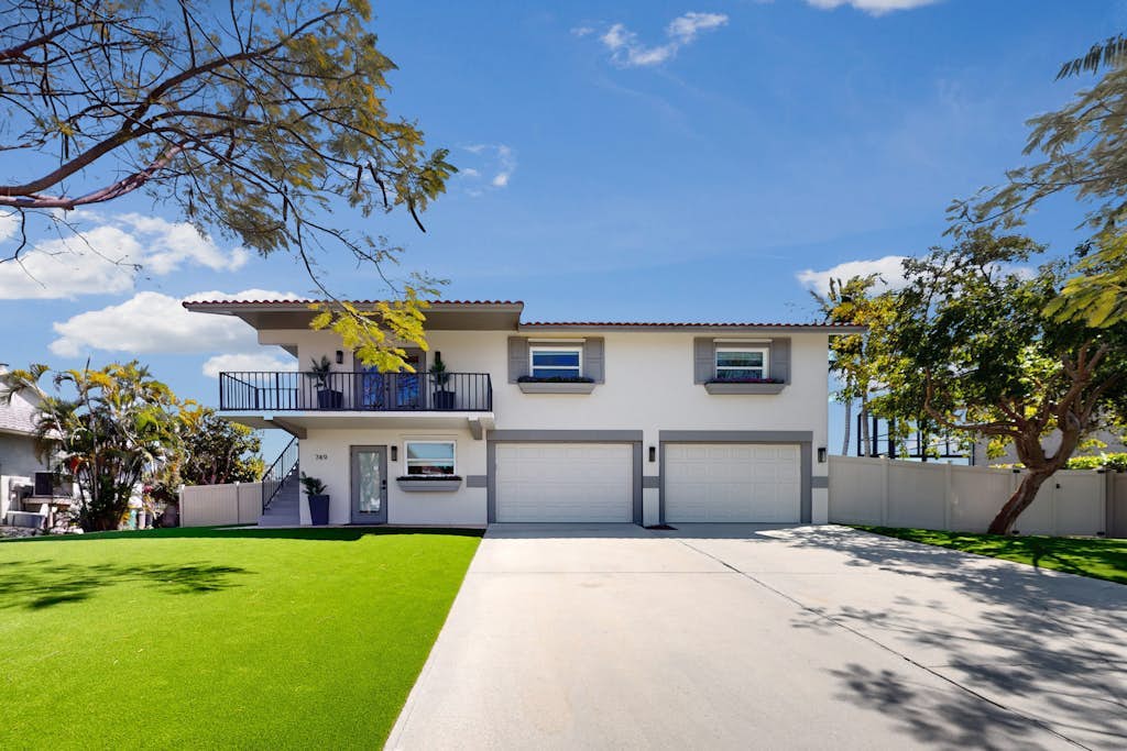 Snowbird-friendly home with private pool, enclosed lanai, & putting green
