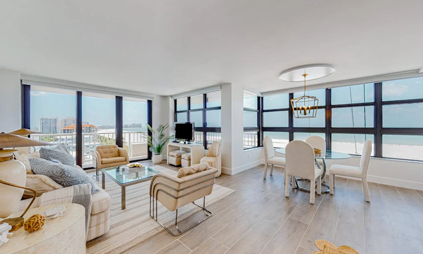 Gulf-front getaway with on-site pool, tennis, putting green, dock, & gym