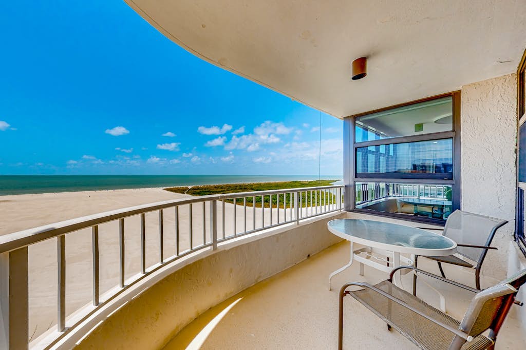 Gulf-front getaway with on-site pool, tennis, putting green, dock, & gym