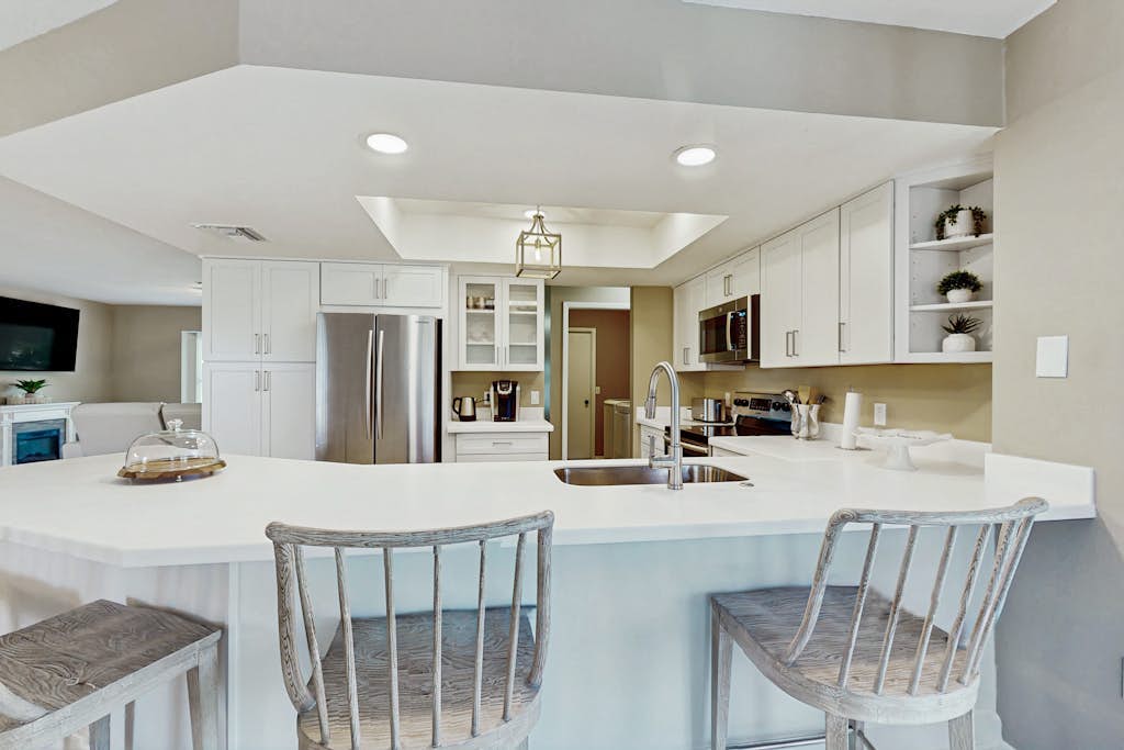Luxurious pool home close to the beach, family friendly with AC and WIFI