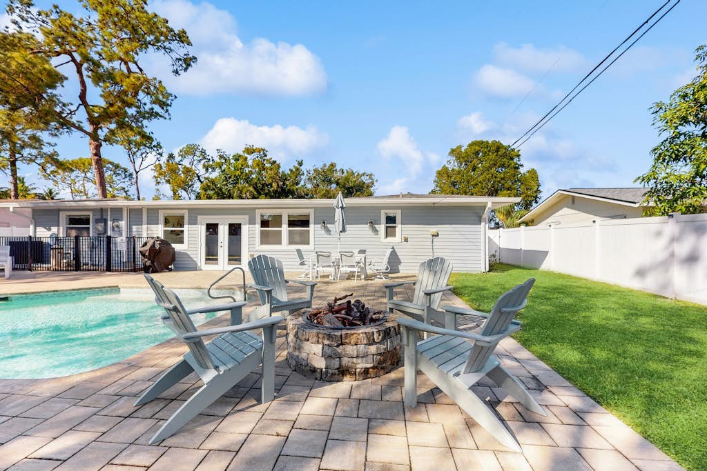 Coastal home with private pool, arcade games, and firepit