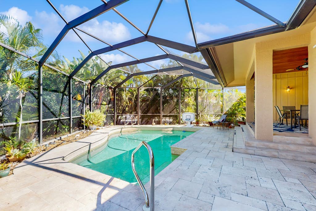 Exquisite home near Marco Island Beach with saltwater pool, patio & dogs