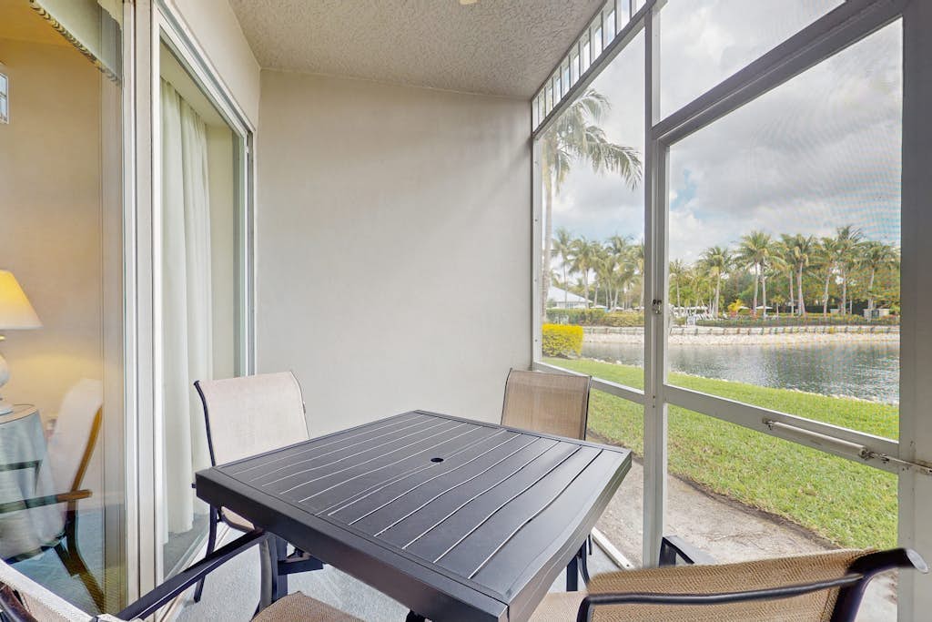 Lakefront home with water view, golf, pool, hot tub, & tennis