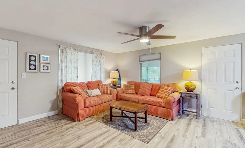 Cozy retreat with fenced yard, boat dock, and washer & dryer