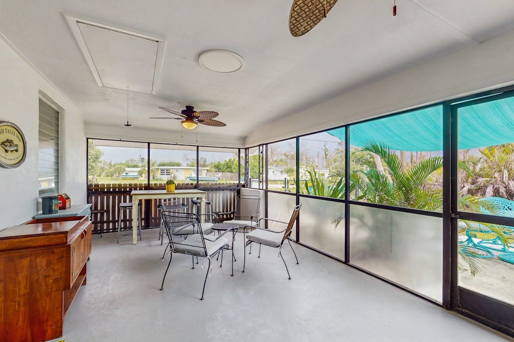 Cozy retreat with fenced yard, boat dock, and washer & dryer
