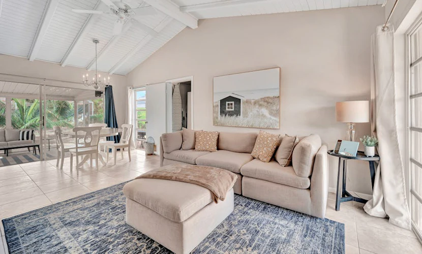 Updated tropical home with a private patio, beach gear, AC, and washer/dryer