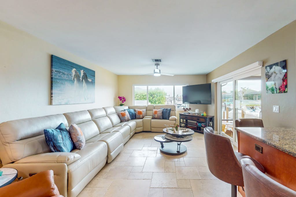 Gorgeous waterfront home with private pool, dock and outdoor space