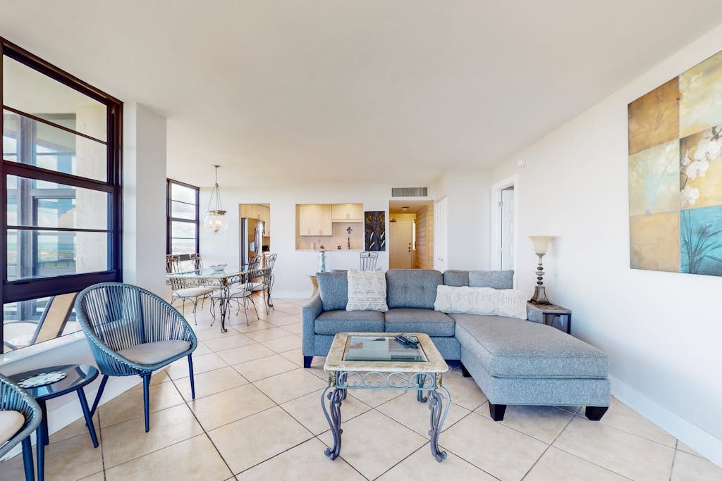 Brilliant water view condo w/ shared pool, private washer &dryer, & sunset views
