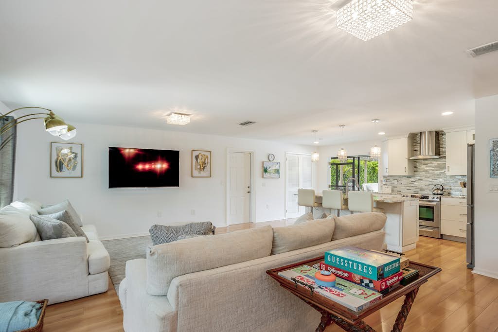 Inviting retreat with a large yard, heated pool, firepit, games & modern charm