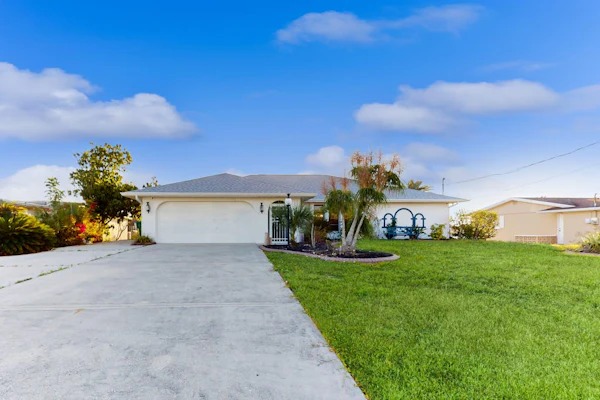 Snowbird Friendly Waterfront Escape with Private Pool, Dock & Serene Canal Views