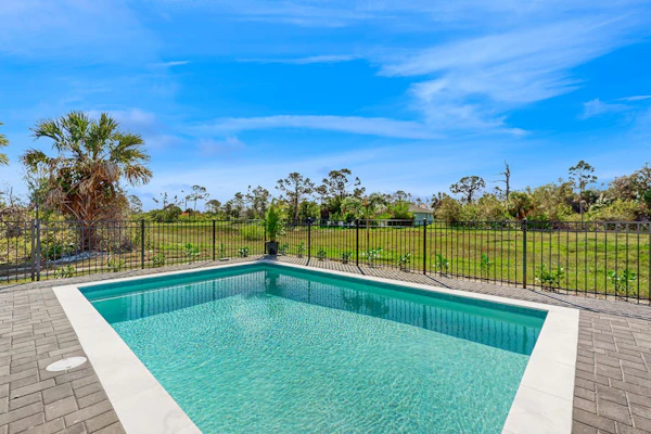 Well appointed new home with private pool, large yard, W/D & dog friendly
