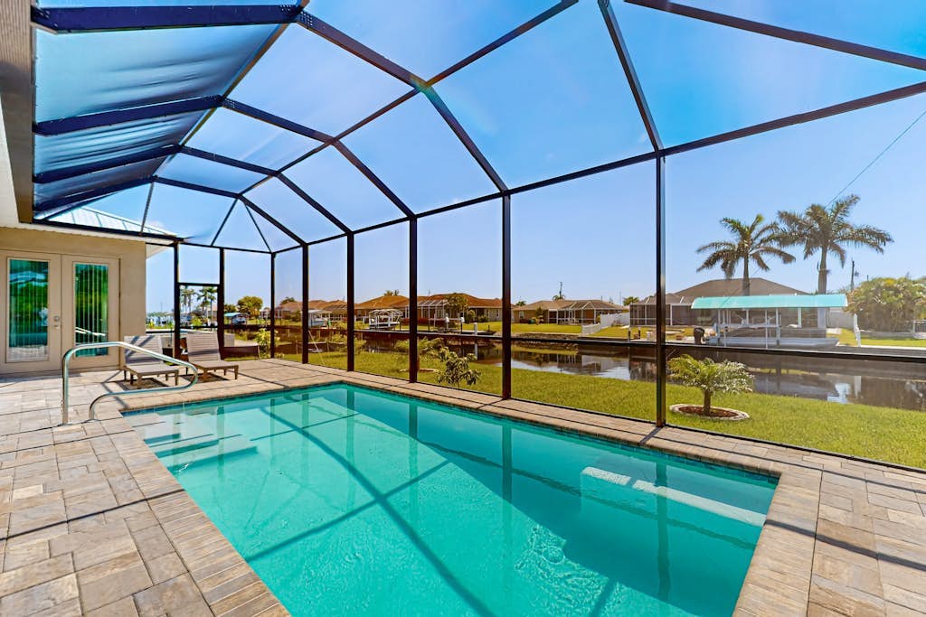 Luxurious waterfront home, pool, Gulf access, and pool table