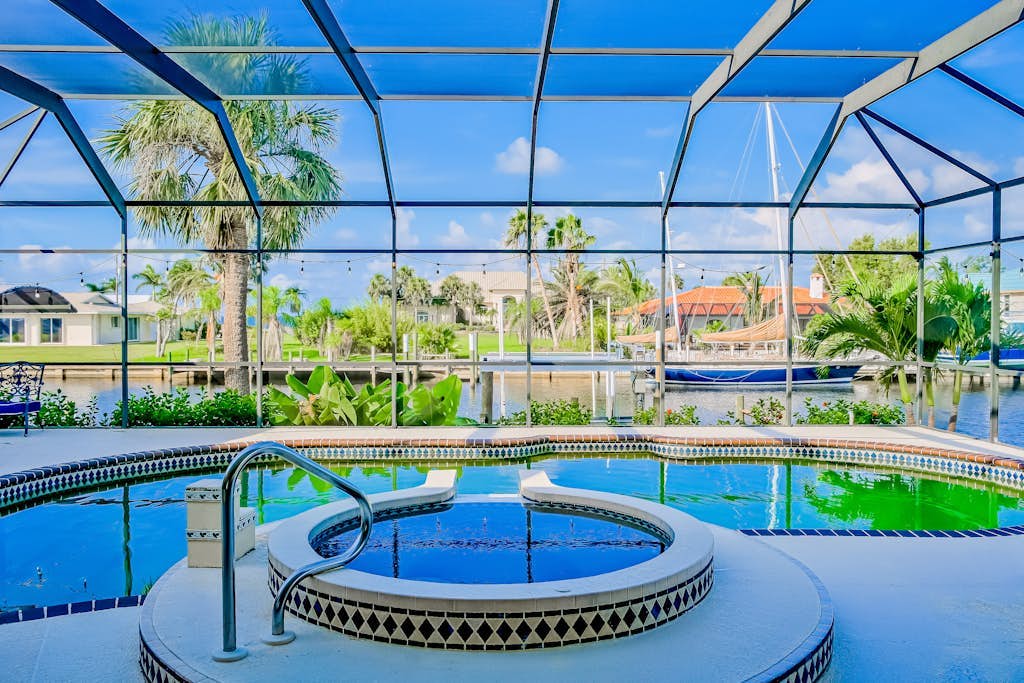 Waterfront Escape with Heated Pool, Stunning Sunsets & Coastal Charm