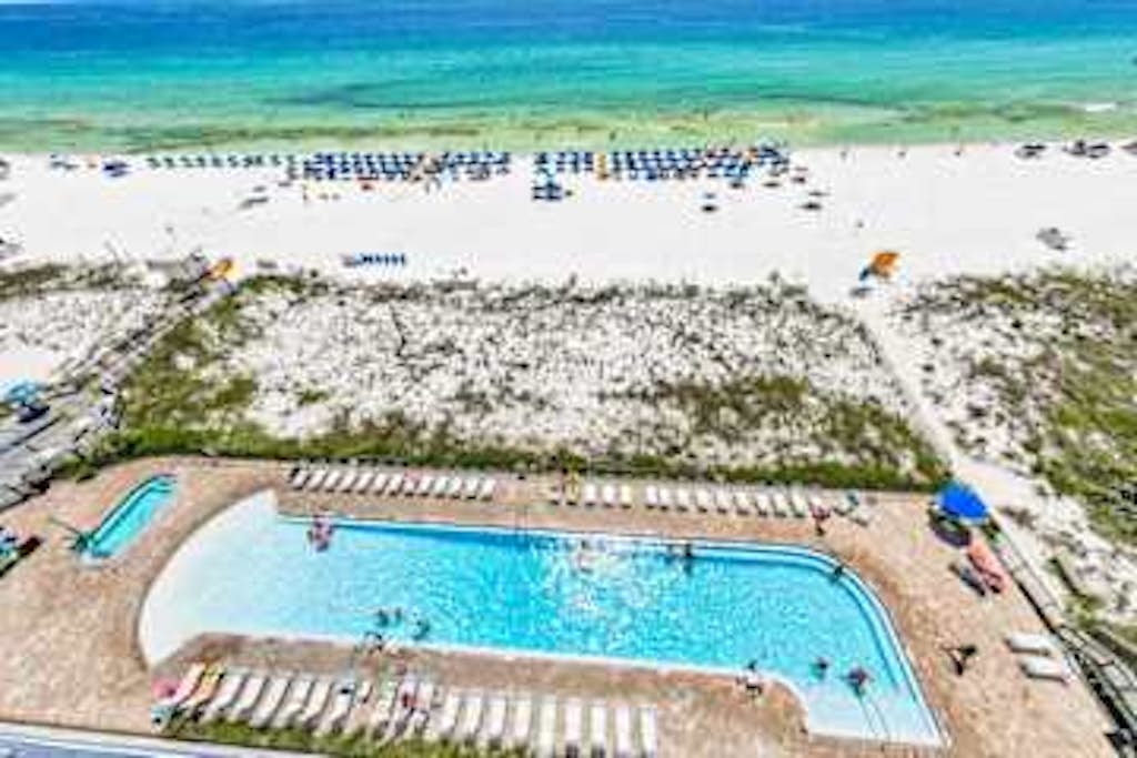 Gulf front condo with resort amenities, steps to the beach