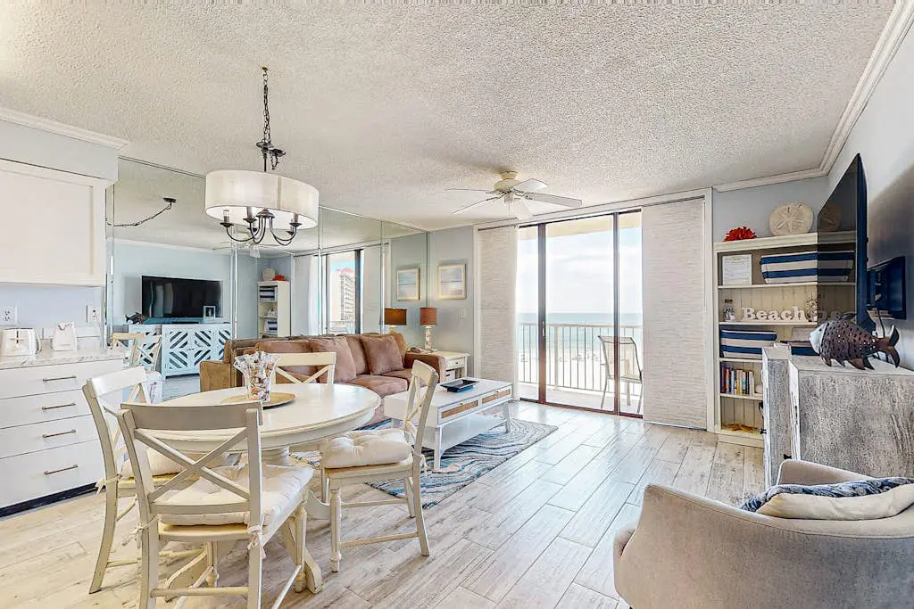 Gulf-view condo with central AC, WiFi, laundry, pools, gym & tennis