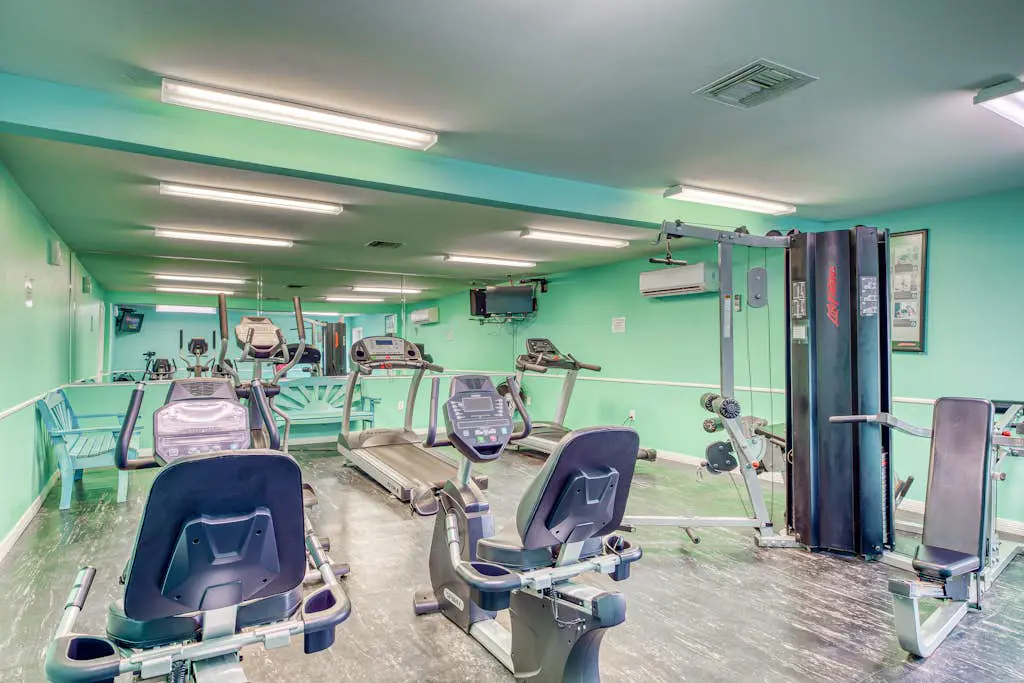 Gulf-view condo with central AC, WiFi, laundry, pools, gym & tennis