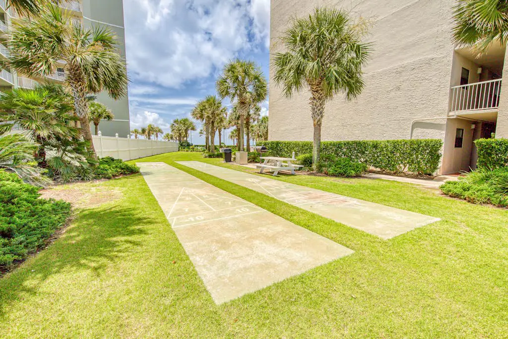 Gulf-view condo with central AC, WiFi, laundry, pools, gym & tennis