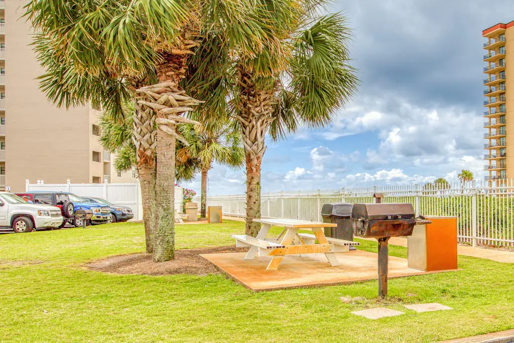 Gulf-view condo with central AC, WiFi, laundry, pools, gym & tennis