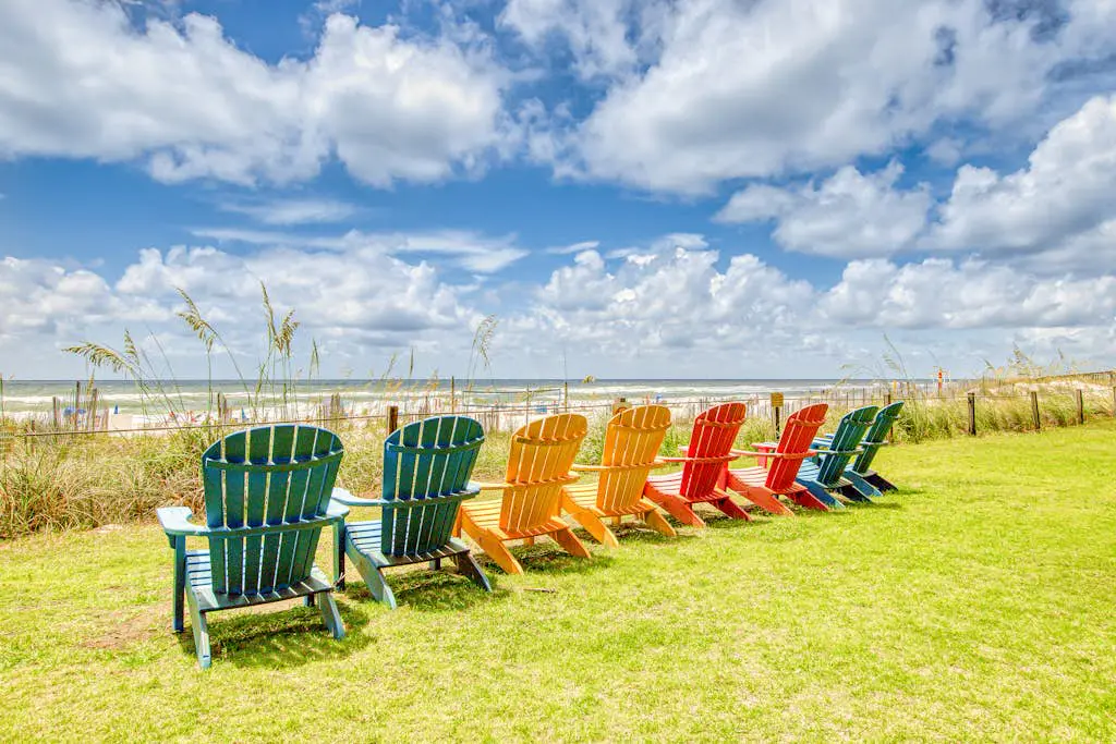 Gulf-view condo with central AC, WiFi, laundry, pools, gym & tennis