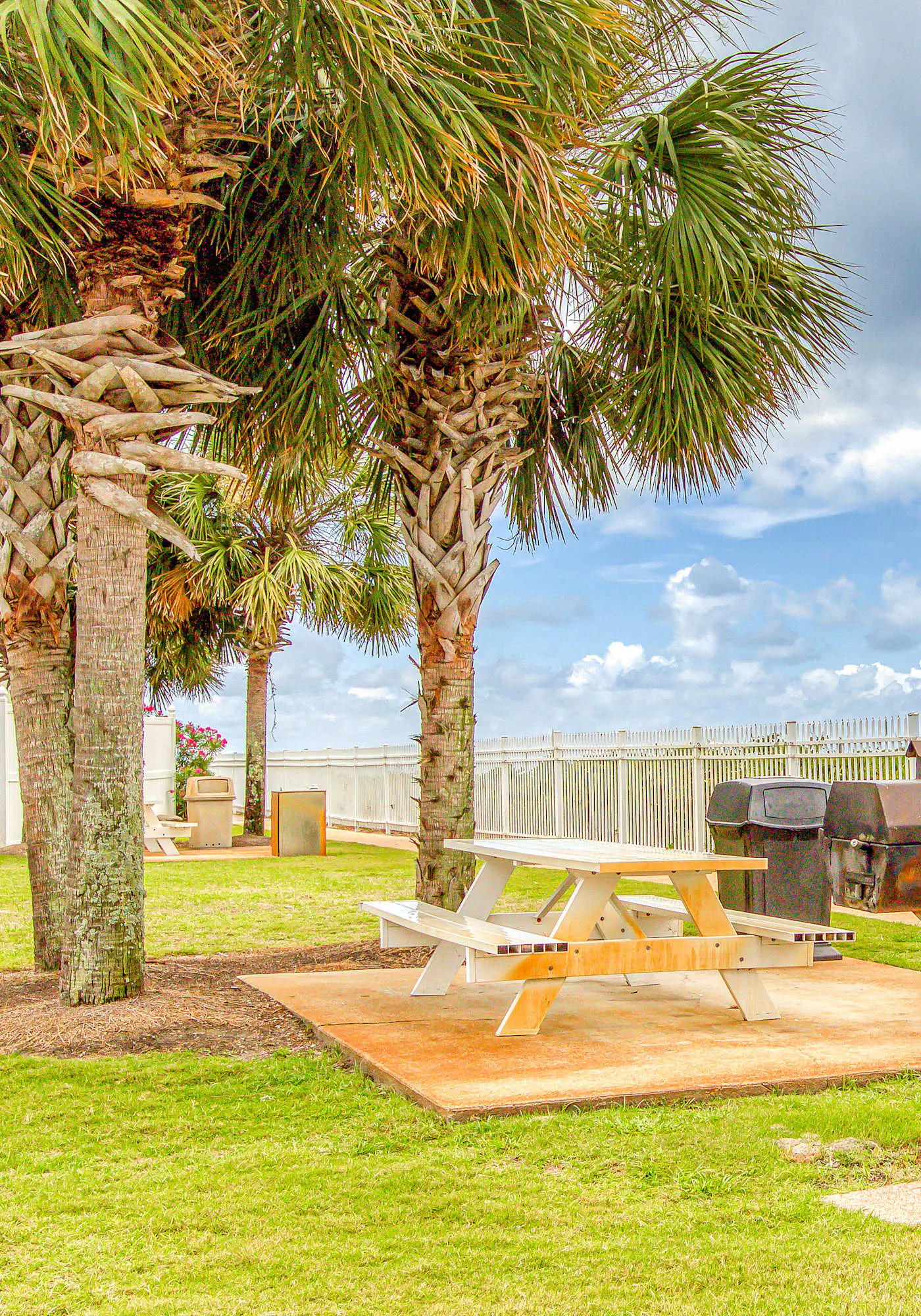 Gulf-view condo with central AC, WiFi, laundry, pools, gym & tennis