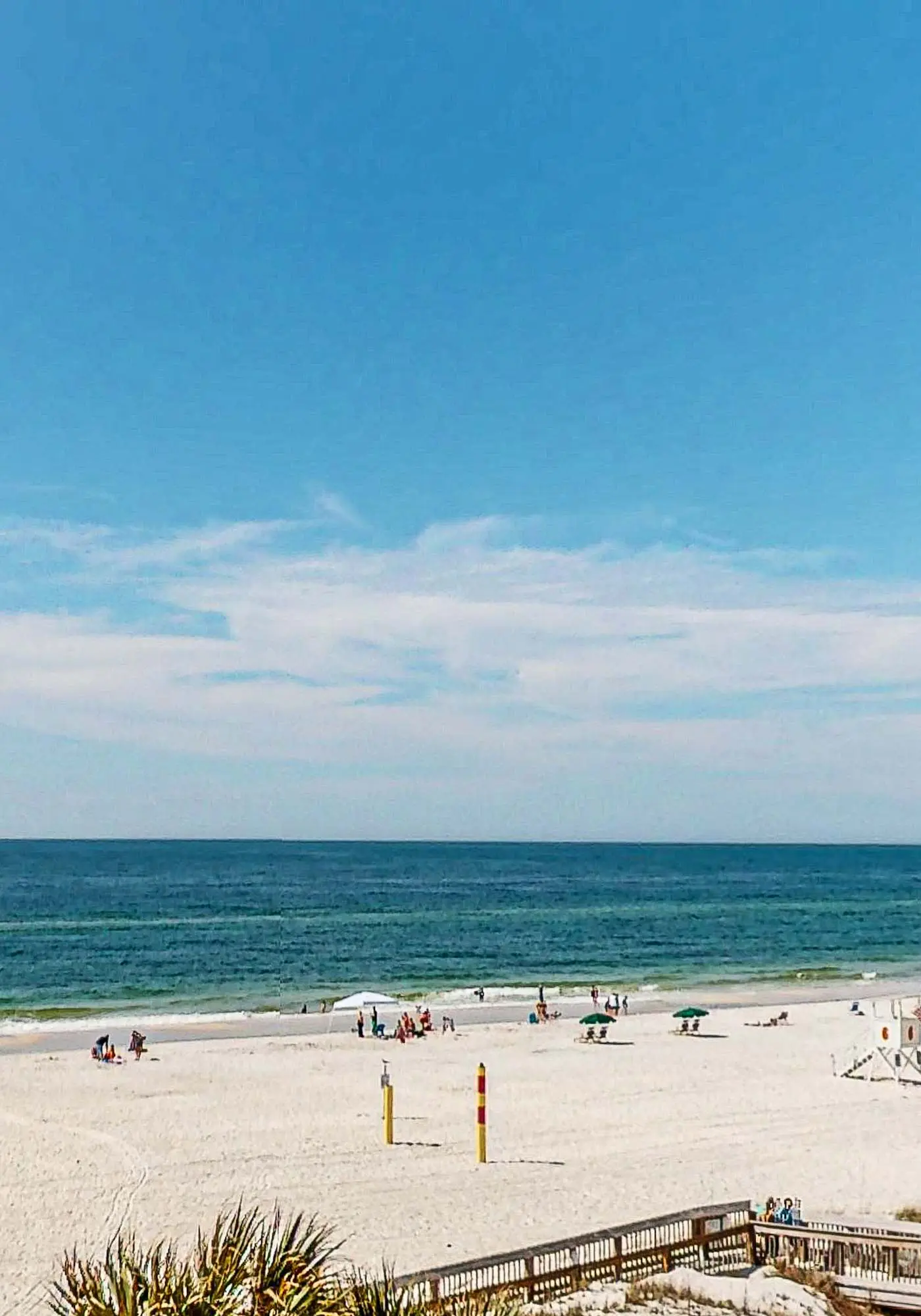 Gulf-view condo with central AC, WiFi, laundry, pools, gym & tennis