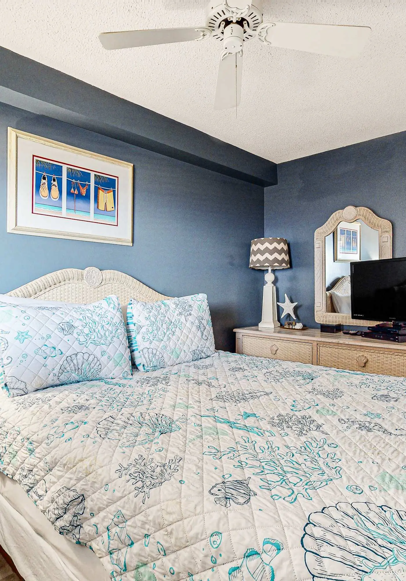 Gulf-view condo with central AC, WiFi, laundry, pools, gym & tennis