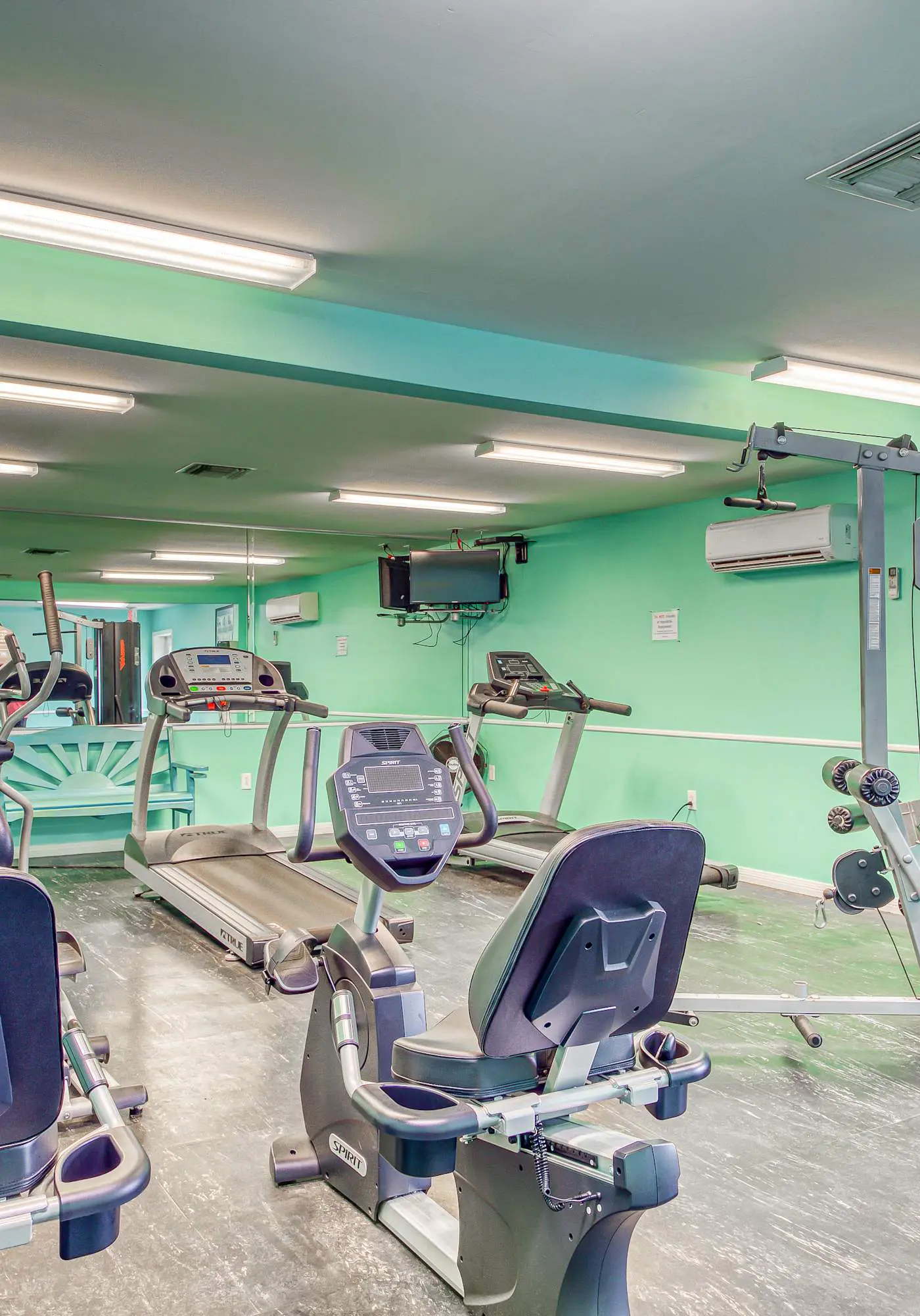 Gulf-view condo with central AC, WiFi, laundry, pools, gym & tennis