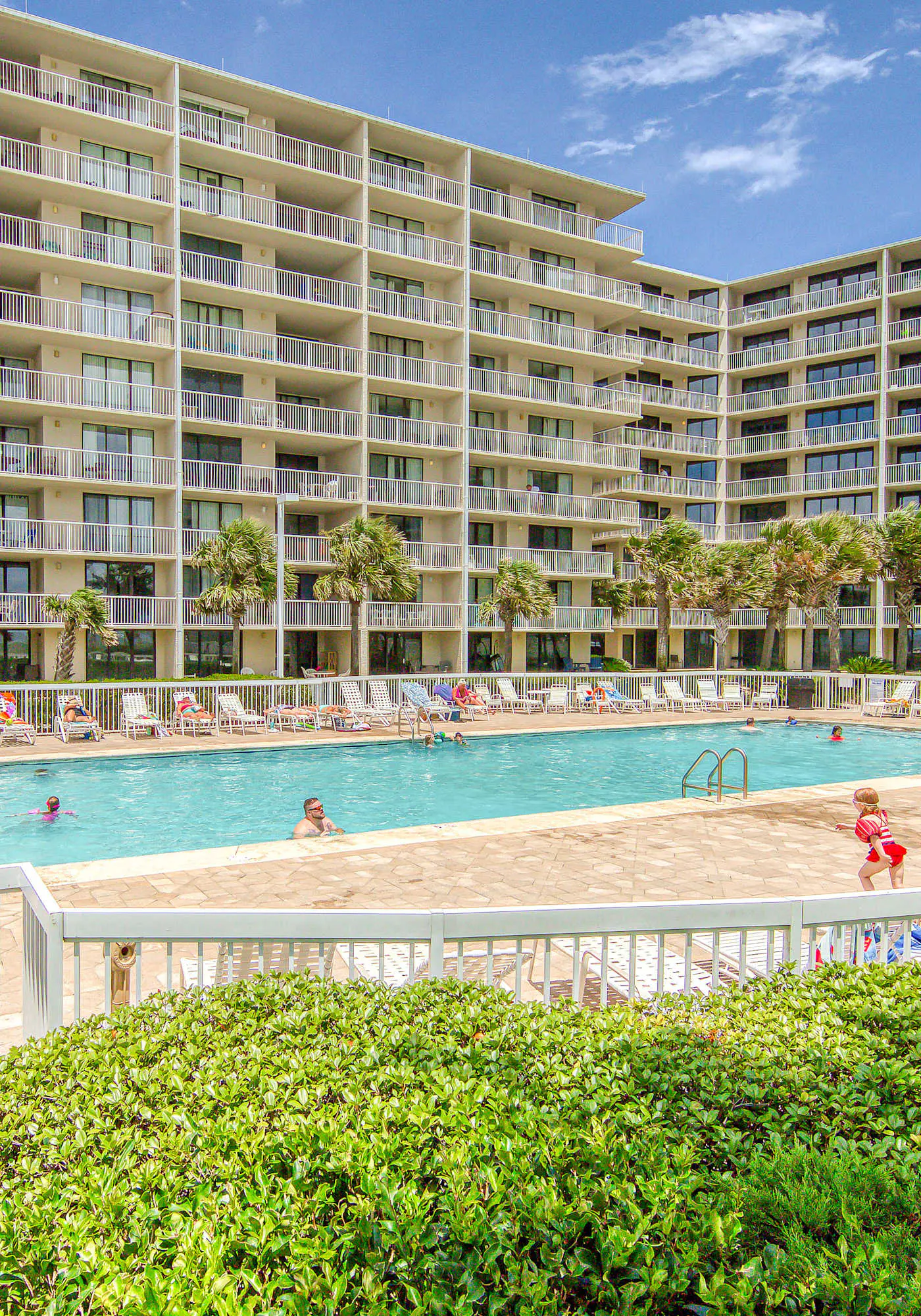 Gulf-view condo with central AC, WiFi, laundry, pools, gym & tennis