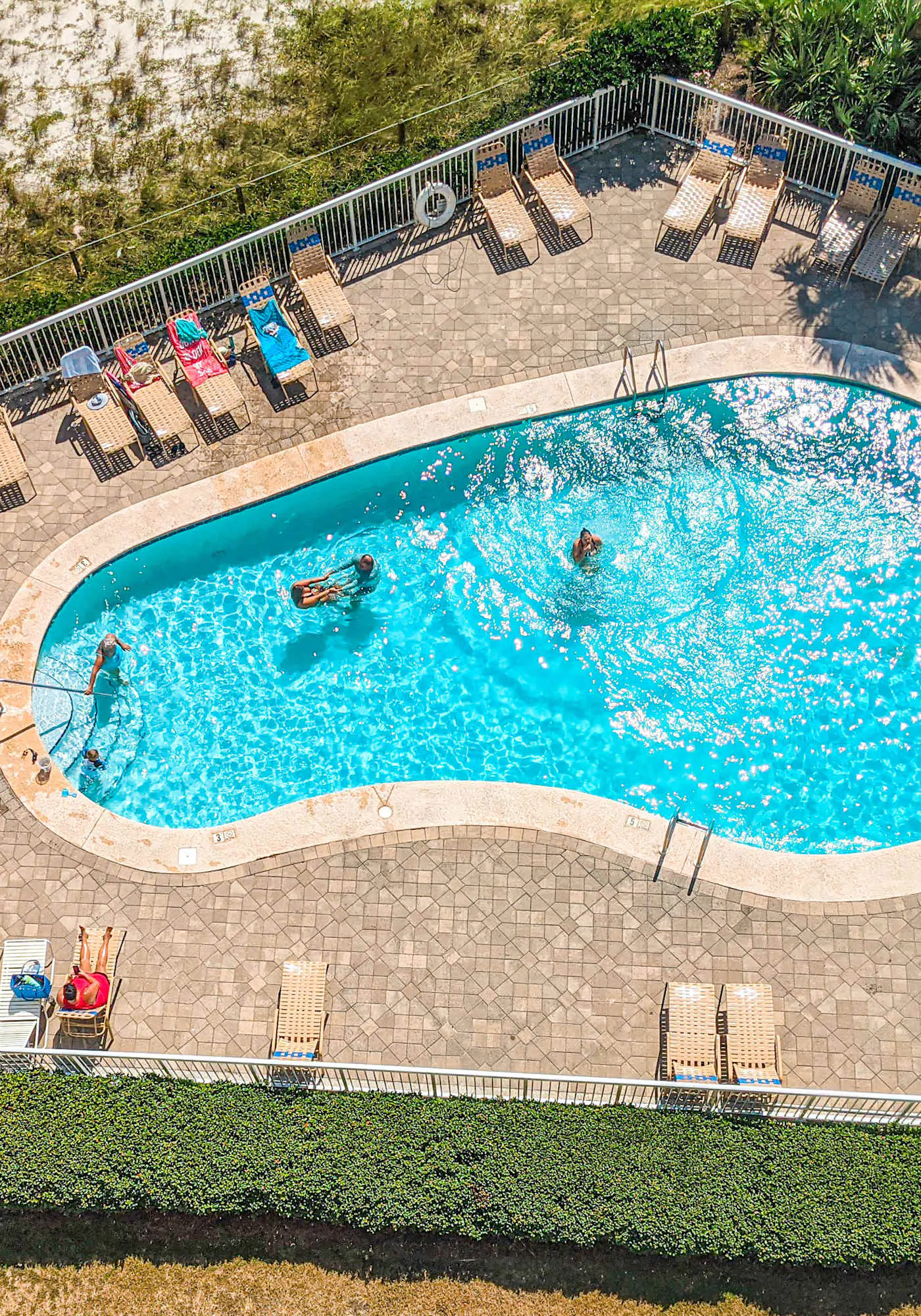 Gulf-view condo with central AC, WiFi, laundry, pools, gym & tennis